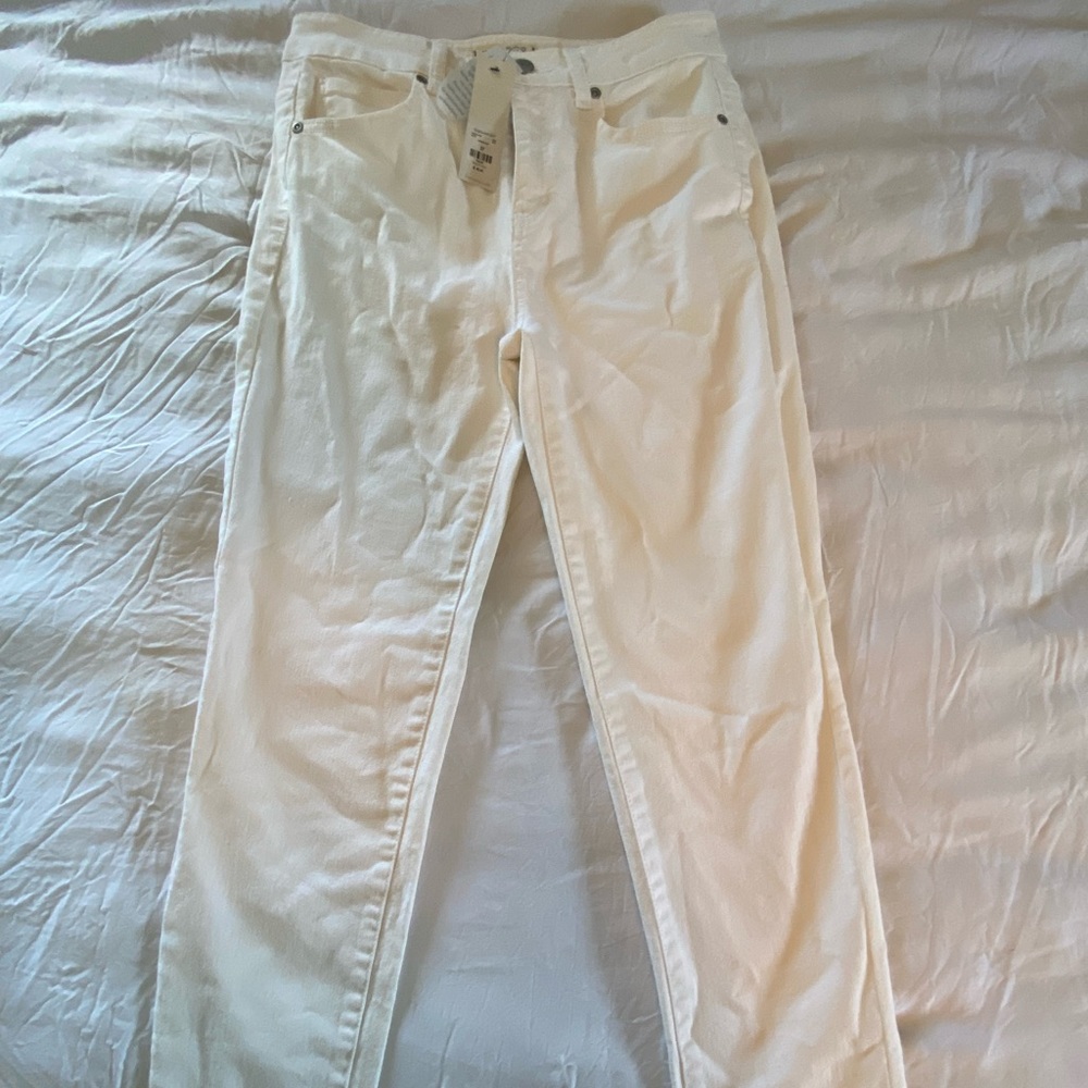 White Skinny jeans with fringe on bottom